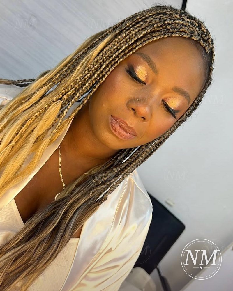 Maquillaje dorado para sesión de novia con trenzas